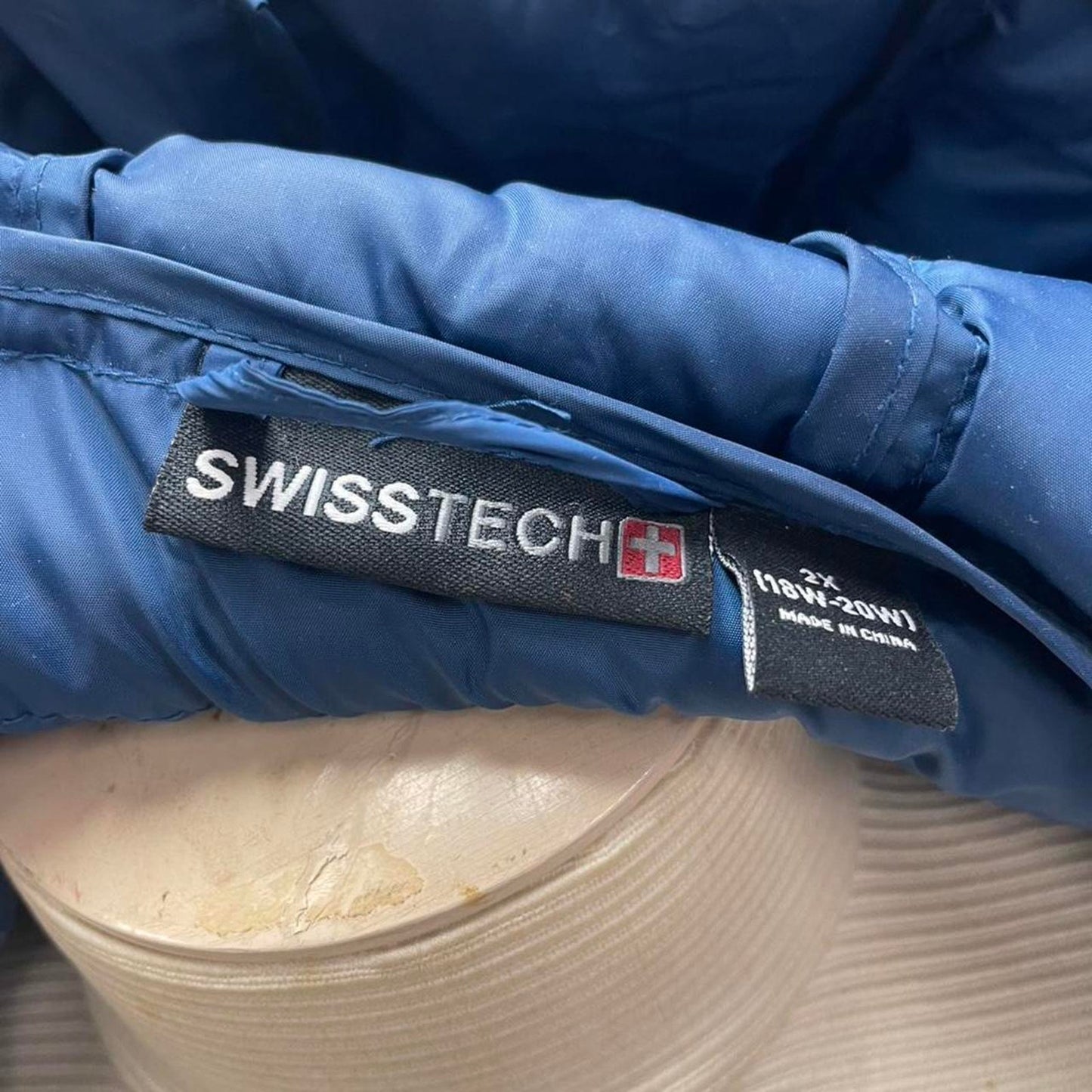 Swiss tech blue puffer coat