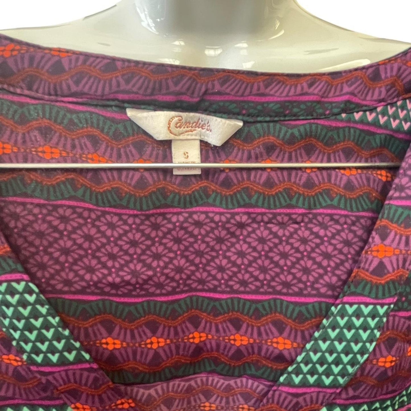 Purple and green striped blouse