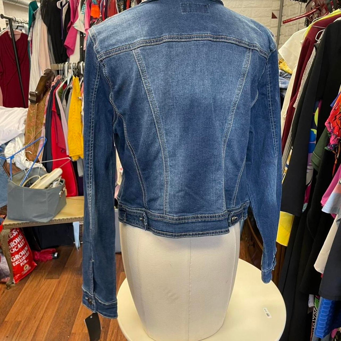 Blue denim jacket with button