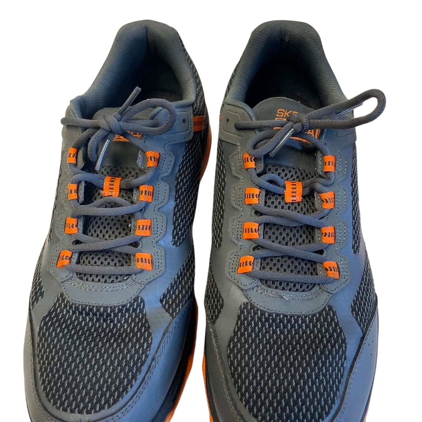 Grey and orange skechers trainers