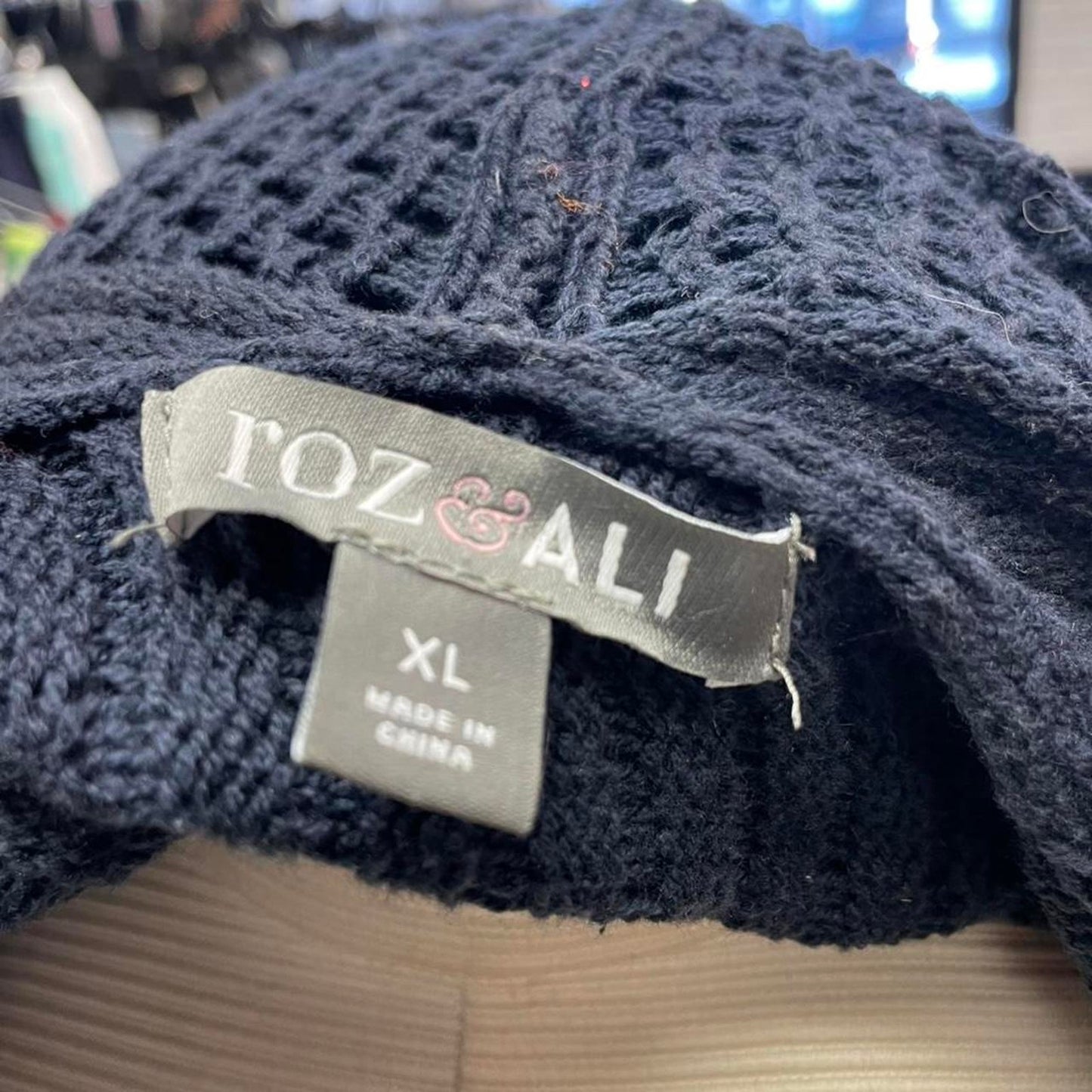 Navy blue knit cardigan with