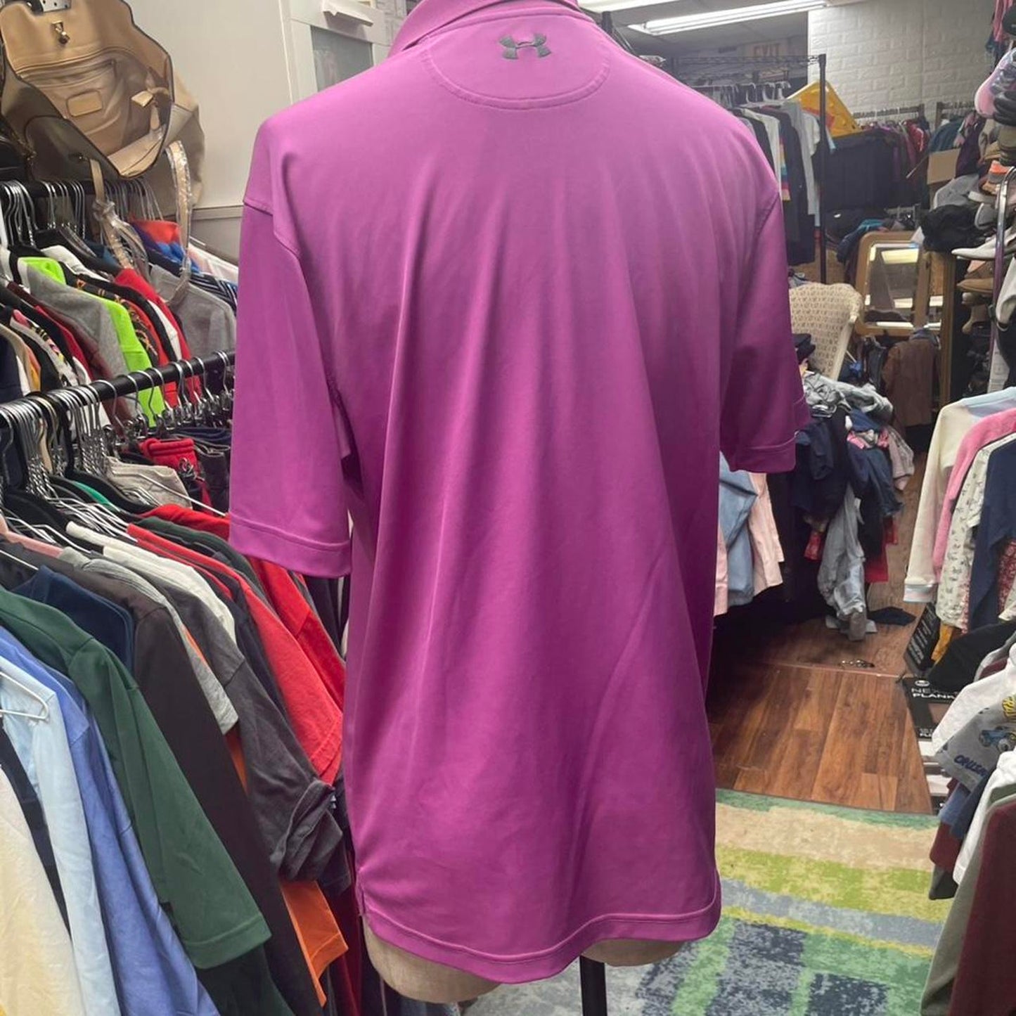 Under armour pink polo shirt